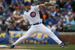 CHICAGO - APRIL 15: Starting pitcher Rich Harden of the Chicago Cubs, wearing a #42 jersey during the Jackie Robinson Day game, delivers the ball against the Colorado Rockies on April 15, 2009 at Wrigley Field in Chicago, Illinois. (Photo by Jonathan Daniel/Getty Images)