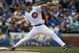 CHICAGO - APRIL 15: Starting pitcher Rich Harden of the Chicago Cubs, wearing a #42 jersey during the Jackie Robinson Day game, delivers the ball against the Colorado Rockies on April 15, 2009 at Wrigley Field in Chicago, Illinois. (Photo by Jonathan Daniel/Getty Images)