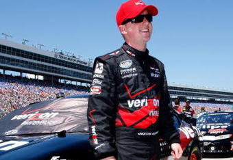 FORT WORTH, TX - APRIL 04:  Justin Allgaier, driver of the #12 Verizon FIOS Dodge, stands on the grid during the NASCAR Nationwide Series O'Reilly 300 at Texas Motor Speedway on April 4, 2009 in Fort Worth, Texas.  (Photo by John Harrelson/Getty Images)