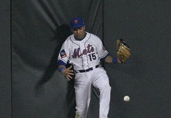 NEW YORK - JUNE 10:  Carlos Beltran #15 of the New York Mets misses a ball hit by Jayson Werth of the Philadelphia Phillies scoring a run in the seventh inning June 10, 2009 at Citi Field in the Flushing neighborhood of the Queens borough of New York City.  (Photo by Al Bello/Getty Images)