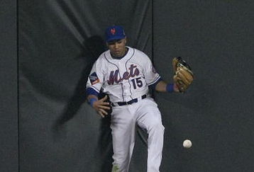 NEW YORK - JUNE 10:  Carlos Beltran #15 of the New York Mets misses a ball hit by Jayson Werth of the Philadelphia Phillies scoring a run in the seventh inning June 10, 2009 at Citi Field in the Flushing neighborhood of the Queens borough of New York City.  (Photo by Al Bello/Getty Images)