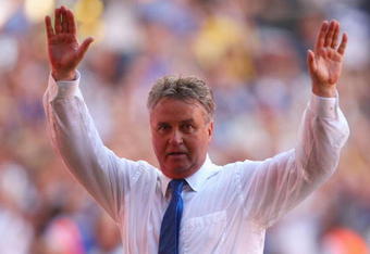 LONDON, ENGLAND - MAY 30:  Chelsea Manager Guus Hiddink celebrates victory during the FA Cup sponsored by E.ON Final match between Chelsea and Everton at Wembley Stadium on May 30, 2009 in London, England.  (Photo by Mike Hewitt/Getty Images)
