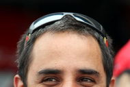 DARLINGTON, SC - MAY 08: Juan Pablo Montoya, driver of the #42 Target Chevrolet, stands in the garage area during a break in practice for the NASCAR Sprint Cup Series Southern 500 on May 8, 2009 at Darlington Raceway in Darlington, South Carolina. (Photo by Elsa/Getty Images for NASCAR)