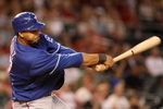 PHOENIX - JUNE 23:  Nelson Cruz #17 of the Texas Rangers bats against the Arizona Diamondbacks during the major league baseball game at Chase Field on June 23, 2009 in Phoenix, Arizona. The Diamondbacks defeated the Rangers 8-2.  (Photo by Christian Petersen/Getty Images)