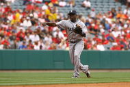 ANAHEIM, CA - MAY 31:  Yuniesky Betancourt #7 of the Seattle Mariners throws to first base against the Los Angeles Angels of Anaheim at Angel Stadium on May 31, 2009 in Anaheim, California.  (Photo by Jeff Gross/Getty Images)