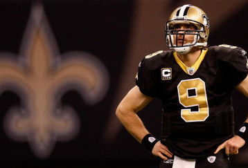 NEW ORLEANS - DECEMBER 28:  Quarterback Drew Brees #9 of the New Orleans Saints waits during a timeout against the Carolina Panthers 33-31 on December 28, 2008 at the Superdome in New Orleans, Louisiana.  (Photo by Chris Graythen/Getty Images)