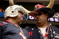 HOUSTON - OCTOBER 05: Houston Texans fans talk during the game against the Indianapolis Colts on October 5, 2008 at Reliant Stadium in Houston, Texas.  The Colts won 31-27.  (Photo by Stephen Dunn/Getty Images)