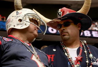 HOUSTON - OCTOBER 05: Houston Texans fans talk during the game against the Indianapolis Colts on October 5, 2008 at Reliant Stadium in Houston, Texas.  The Colts won 31-27.  (Photo by Stephen Dunn/Getty Images)