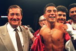 27 May 1994: Oscar De La Hoya Celebrates with promoter Bob Arum after retaining his WBO Junior Lightweight Belt against challenger Giorgio Campanella at the MGM Grand Hotel in Las Vegas.
