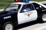 FORT WORTH, TX  MAY 29:  Fort Worth police officer J.R. Bell drag races down pit lane at Texas Motor Speedway to kickoff the new Scion Drag-n-Brag organized street racing series May 29, 2009 in Fort Worth, Texas. The series will feature racing in four different classes down a 1/8-mile drag strip along pit lane and a 'Show & Shine' program and will a season champion will be named August 7.  (Photo By Tom Pennington/Getty Images for the Texas Motor Speedway)