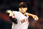 PHOENIX - JUNE 11:  Starting pitcher Jonathan Sanchez #57 of the San Francisco Giants pitches against the Arizona Diamondbacks during the major league baseball game at Chase Field on June 11, 2009 in Phoenix, Arizona.  (Photo by Christian Petersen/Getty Images)