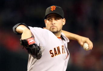 PHOENIX - JUNE 11:  Starting pitcher Jonathan Sanchez #57 of the San Francisco Giants pitches against the Arizona Diamondbacks during the major league baseball game at Chase Field on June 11, 2009 in Phoenix, Arizona.  (Photo by Christian Petersen/Getty Images)