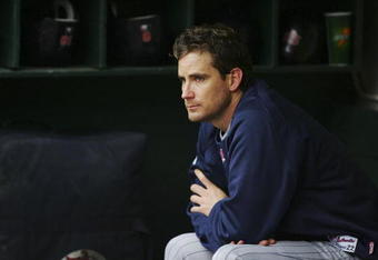 OAKLAND, CA - OCTOBER 06:  Brad Radke #22 of the Minnesota Twins pitches looks on after being relieved during game three of the American League Division Series against the Oakland Athletics at McAfee Coliseum on October 6, 2006 in Oakland, California.  (Photo by Jed Jacobsohn/Getty Images)