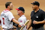NEW YORK - SEPTEMBER 06:  First base coach Glenn Hubbard of the Atlanta Braves gets between Jeff Francoeur #7 and umpire Kerwin Danley as Francoeur argues after being called out on fan interference against the New York Mets as Edgar Renteria #11 looks on on September 6, 2006 during the second game of their doubleheader at Shea Stadium in the Flushing neighborhood of the Queens borough of New York City.   (Photo by Jim McIsaac/Getty Images)