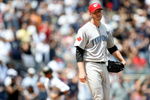 NEW YORK - JULY 04:  Roy Halladay #32 of the Toronto Blue Jays reacts after Jorge Posada #20 of the New York Yankees hit a home run in the fourth inning on July 4, 2009 at Yankee Stadium in the Bronx borough of New York City.  (Photo by Nick Laham/Getty Images)