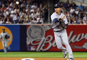 NEW YORK - JULY 01:  Ronny Cedeno #3 of the Seattle Mariners throws against the New York Yankees on July 1, 2009 at Yankee Stadium in the Bronx borough of New York City. The Yankees defeated the Mariners 4-2.  (Photo by Jim McIsaac/Getty Images)