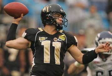 CHARLOTTE, NC - DECEMBER 29:  Riley Skinner #11 of the Wake Forest Demon Deacons throws a pass against the Connecticut Huskies during their game at Bank of America Stadium on December 29, 2007 in Charlotte, North Carolina. (Photo by Streeter Lecka/Getty Images)