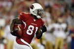 GLENDALE, AZ - NOVEMBER 10:  Anquan Boldin #81 of the Arizona Cardinals takes a handoff against the San Francisco 49ers during the game at University of Phoenix Stadium on November, 10 2008 in Glendale, Arizona.  (Photo by Harry How/Getty Images)