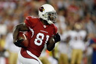 GLENDALE, AZ - NOVEMBER 10: Anquan Boldin #81 of the Arizona Cardinals takes a handoff against the San Francisco 49ers during the game at University of Phoenix Stadium on November, 10 2008 in Glendale, Arizona. (Photo by Harry How/Getty Images)