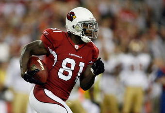 GLENDALE, AZ - NOVEMBER 10:  Anquan Boldin #81 of the Arizona Cardinals takes a handoff against the San Francisco 49ers during the game at University of Phoenix Stadium on November, 10 2008 in Glendale, Arizona.  (Photo by Harry How/Getty Images)