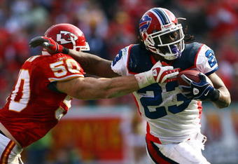KANSAS CITY, MO - NOVEMBER 23:  Marshawn Lynch #23 of the Buffalo Bills evades Rocky Boiman #50 of the Kansas City Chiefs during the first half of the game against the Kansas City Chiefs on November 23, 2008 at Arrowhead Stadium in Kansas City, Missouri.  (Photo by Jamie Squire/Getty Images)
