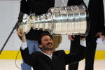 DETROIT - JUNE 12:  Co-Ownter and Chairman Mario Lemieux of the Pittsburgh Penguins hoists the Stanley Cup overhead after Game Seven of the 2009 NHL Stanley Cup Finals against the Detroit Red Wings at Joe Louis Arena on June 12, 2009 in Detroit, Michigan. The Penguins defeated the Red Wings 2-1 in the seventh game to win the Stanley Cup Finals series 4 games to 3. (Photo by Harry How/Getty Images)