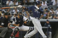 NEW YORK - JUNE 08:  Carl Crawford #13 of the Tampa Bay Rays at bat against the New York Yankees on June 8, 2009 at Yankee Stadium in the Bronx borough of New York City.  (Photo by Nick Laham/Getty Images)