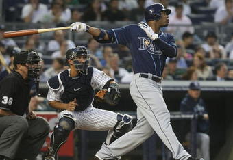 NEW YORK - JUNE 08:  Carl Crawford #13 of the Tampa Bay Rays at bat against the New York Yankees on June 8, 2009 at Yankee Stadium in the Bronx borough of New York City.  (Photo by Nick Laham/Getty Images)