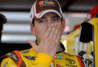 JOLIET, IL - JULY 09:  Kyle Busch, driver of the #18 M&M's Toyota, stands in the garage during practice for the NASCAR Sprint Cup Series LifeLock.com 400 at Chicagoland Speedway on July 9, 2009 in Joliet, Illinois.  (Photo by Rusty Jarrett/Getty Images for NASCAR)