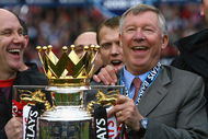 MANCHESTER, ENGLAND - MAY 16:  Manchester United Manager Sir Alex Ferguson (R) and Assistant Mike Phelan celebrate with the Barclays Premier League trophy after their side won the Premier League title at the end of the Barclays Premier League match between Manchester United and Arsenal at Old Trafford on May 16, 2009 in Manchester, England.  (Photo by Alex Livesey/Getty Images)