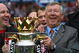 MANCHESTER, ENGLAND - MAY 16: Manchester United Manager Sir Alex Ferguson (R) and Assistant Mike Phelan celebrate with the Barclays Premier League trophy after their side won the Premier League title at the end of the Barclays Premier League match between Manchester United and Arsenal at Old Trafford on May 16, 2009 in Manchester, England. (Photo by Alex Livesey/Getty Images)