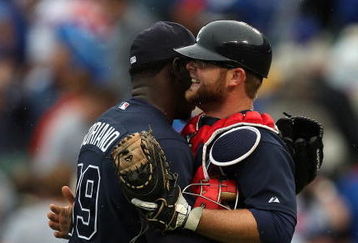 CHICAGO - JULY 08: Rafael Soriano #39 of the Atlanta Braves gets a hug from catcher Brian McCann after finshing off the Chicago Cubs in the 9th inning on July 8, 2009 at Wrigley Field in Chicago, Illinois. The Braves defeated the Cubs 4-1.  (Photo by Jonathan Daniel/Getty Images)