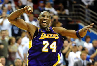 ORLANDO, FL - JUNE 14:  Kobe Bryant #24 of the Los Angeles Lakers celebrates after defeating the Orlando Magic 99-86 in Game Five of the 2009 NBA Finals on June 14, 2009 at Amway Arena in Orlando, Florida.  NOTE TO USER:  User expressly acknowledges and agrees that, by downloading and or using this photograph, User is consenting to the terms and conditions of the Getty Images License Agreement.  (Photo by Ronald Martinez/Getty Images)
