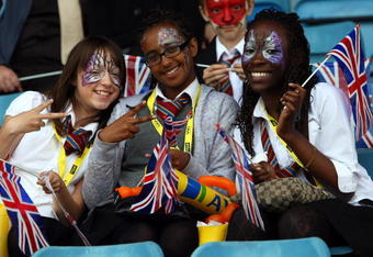 BIRMINGHAM, ENGLAND - JULY 10: Athletics fans enjoy the atmosphere during the 100M womens 1st Round Heats at Alexander Stadium on July 10, 2009 in Birmingham, England.  (Photo by John Gichigi/Getty Images)
