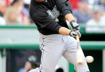 WASHINGTON - APRIL 19:  Cody Ross #12 of the Florida Marlins hits a single in the sixth inning against the Washington Nationals at Nationals Park on April 19, 2009 in Washington, DC.  (Photo by Greg Fiume/Getty Images)