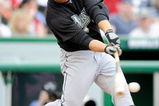 WASHINGTON - APRIL 19:  Cody Ross #12 of the Florida Marlins hits a single in the sixth inning against the Washington Nationals at Nationals Park on April 19, 2009 in Washington, DC.  (Photo by Greg Fiume/Getty Images)