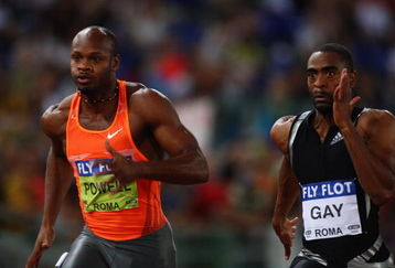 ROME - JULY 10:  Tyson Gay of United States (C) competes ahead of Asafa Powell of Jamaica in the men's 100 metres during the IAAF Golden League Golden Gala track and field event held at the Stadio Olimpico on July 10, 2009 in Rome, Italy.  (Photo by Ryan Pierse/Getty Images)