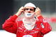 TORONTO, ON - JULY 11:  Dario Franchitti, driver of the #10 Target Chip Ganassi Racing Dallara Honda puts on his fire mask during qualifying for the Indycar Series Honda Indy Toronto on July 11, 2009 in Toronto, Canada.  (Photo by Nick Laham/Getty Images)