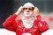 TORONTO, ON - JULY 11:  Dario Franchitti, driver of the #10 Target Chip Ganassi Racing Dallara Honda puts on his fire mask during qualifying for the Indycar Series Honda Indy Toronto on July 11, 2009 in Toronto, Canada.  (Photo by Nick Laham/Getty Images)