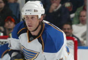 UNIONDALE, NY - OCTOBER 11: Jay McKee #77 of the St. Louis Blues skates against the New York Islanders on October 11, 2008 at the Nassau Coliseum in Uniondale, New York. (Photo by Bruce Bennett/Getty Images)