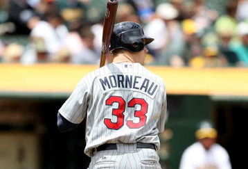 OAKLAND, CA - JUNE 11:  Justin Morneau #33 of the Minnesota Twins bats against the Oakland Athletics during a Major League Baseball game on June 11, 2009 at the Oakland Coliseum in Oakland, California.  (Photo by Jed Jacobsohn/Getty Images)