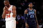 PHOENIX - FEBRUARY 15:  Kobe Bryant #24 of the Western Conference walks across the court in front of LeBron James #23 of the Eastern Conference during the 58th NBA All-Star Game, part of 2009 NBA All-Star Weekend at US Airways Center on February 15, 2009 in Phoenix, Arizona.  NOTE TO USER: User expressly acknowledges and agrees that, by downloading and or using this photograph, User is consenting to the terms and conditions of the Getty Images License Agreement.  (Photo by Kevork Djansezian/Getty Images)