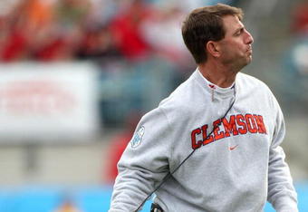 JACKSONVILLE, FL - JANUARY 1:  Head coach Dabo Swinney of the Clemson Tigers throws his headset during the Konica Minolta Gator Bowl against the Nebraska Cornhuskers at Jacksonville Municipal Stadium January 1, 2009 in Jacksonville, Florida.  (Photo by Sam Greenwood/Getty Images)