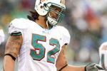 PHILADELPHIA - NOVEMBER 18:  Channing Crowder #52 of the Miami Dolphins looks on during the NFL game against the Philadelphia Eagles at Lincoln Financial Field on November 18, 2007 in Philadelphia, Pennsylvania. (Photo by Al Bello/Getty Images)