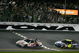 DAYTONA BEACH, FL - JULY 04: Tony Stewart, driver of the #14 Burger King Chevrolet, crosses the finish line ahead of Jimmie Johnson, drive of the #48 Lowe's Kobalt Tools Chevrolet, to win the NASCAR Sprint Cup Series 51st Annual Coke Zero 400 at Daytona International Speedway on July 4, 2009 in Daytona Beach, Florida. (Photo by Jerry Markland/Getty Images for NASCAR)