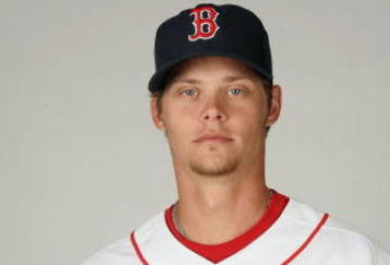 FORT MYERS,FLORIDA - FEBRUARY 22:  Clay Buchholz #61 of the Boston Red Sox poses during photo day at the Red Sox spring training complex on February 22, 2009 in Fort Myers, Florida. (Photo by: Nick Laham/Getty Images)