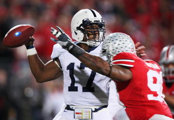 COLUMBUS, OH - OCTOBER 25: Defensive lineman Thaddeus Gibson #90 of the Ohio State Buckeyes pressures quarterback Daryll Clark #17 of the Penn State Nittany Lions in the first half on October 25, 2008 at Ohio Stadium in Columbus, Ohio.  (Photo by Jamie Sabau/Getty Images)