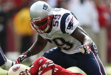SAN FRANCISCO - OCTOBER 05: Gary Guyton #59 of the New England Patriots tackles quarterback J.T. O'Sullivan #14 of the San Francisco 49ers during an NFL game on October 5, 2008 at Candlestick Park in San Francisco, California.  (Photo by Jed Jacobsohn/Getty Images)