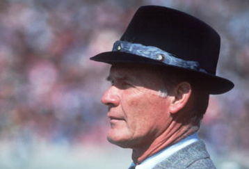 1984:  Head coach Tom Landry of the Dallas Cowboys stands and watches from the sideline during a Cowboys game in the 1984 season.    Mandatory Credit: Jonathan Daniel/ALLSPORT