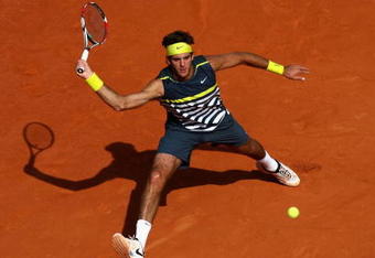 PARIS - JUNE 05:  Juan Martin Del Potro of Argentina stretches to hit a forehand during the Men's Singles Semi Final match against Roger Federer of Switzerland on day thirteen of the French Open at Roland Garros on June 5, 2009 in Paris, France.  (Photo by Ryan Pierse/Getty Images)